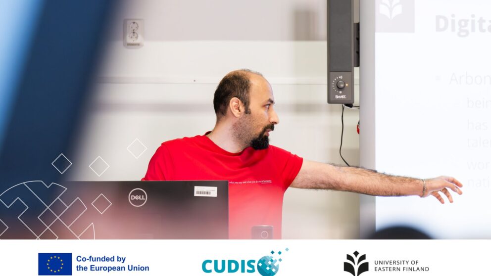 Student Reza Saberi speaking at a CUDIS event