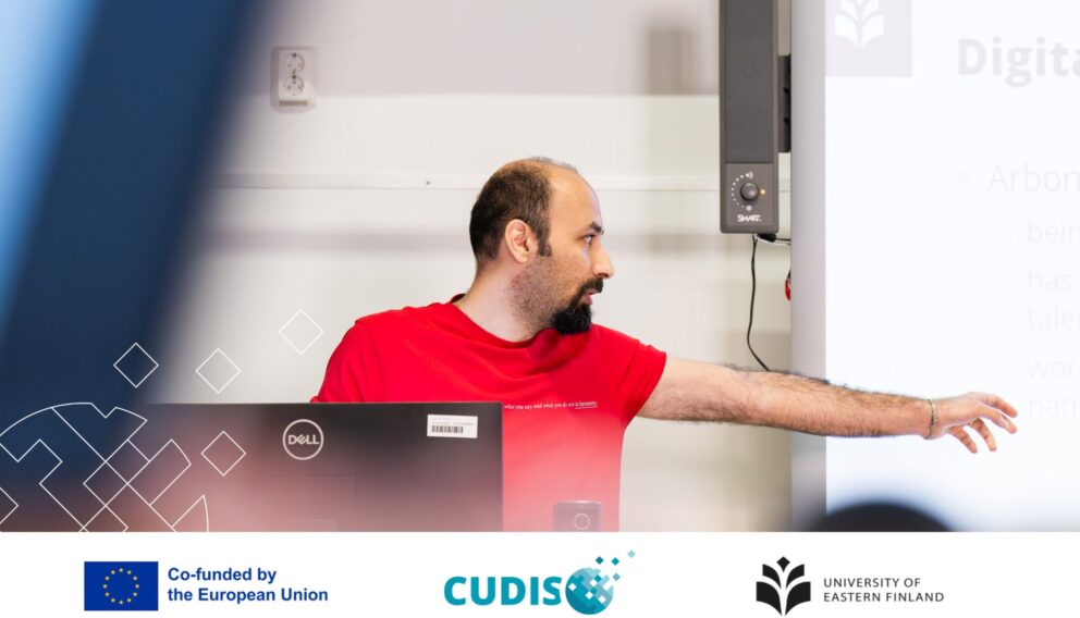 Student Reza Saberi speaking at a CUDIS event