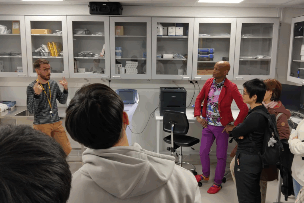 Students standing at a laboratory