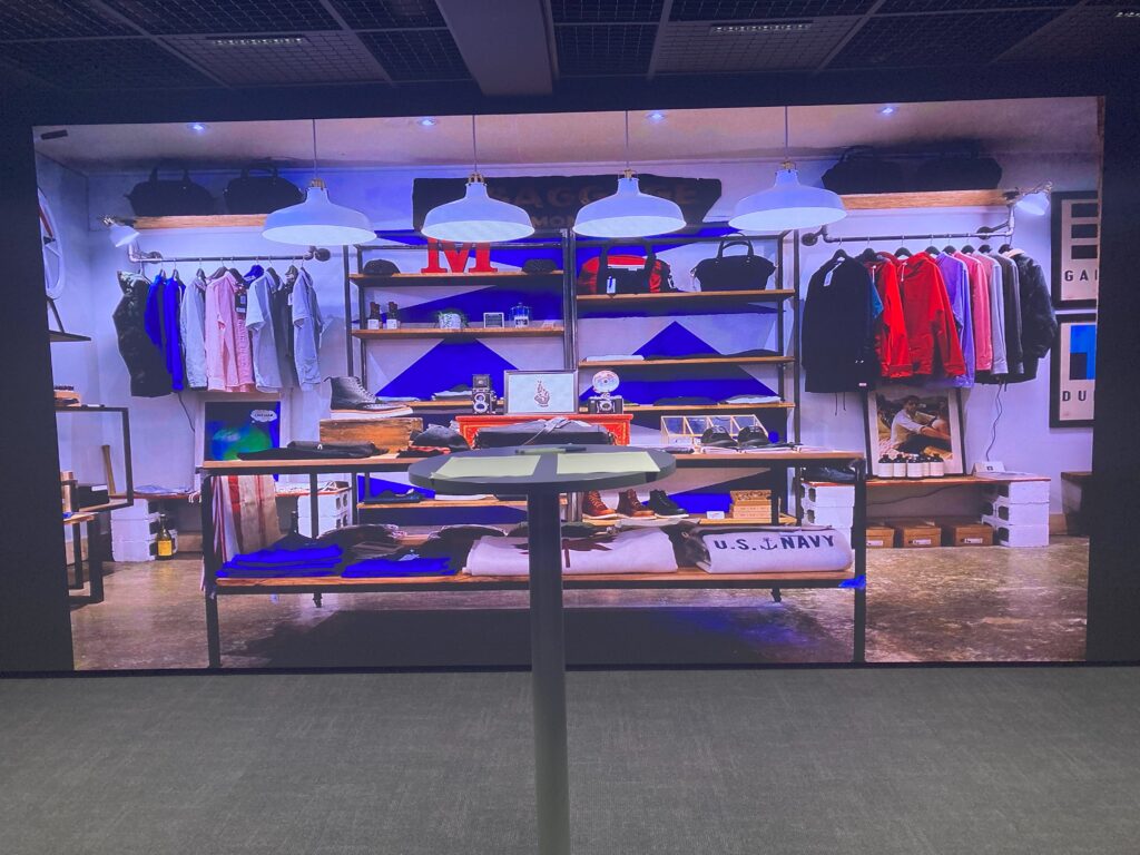 Large screen displaying an image of a store