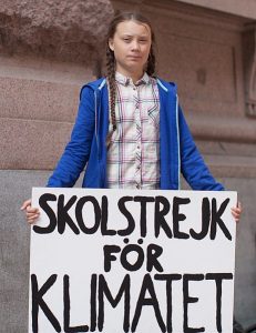 Greta Thunberg ja ilmastolakkokyltti