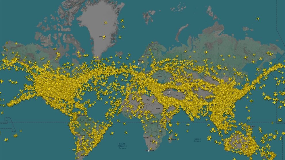 world map with aircraft icons marking their positions, showing flight routes and no-fly zones
