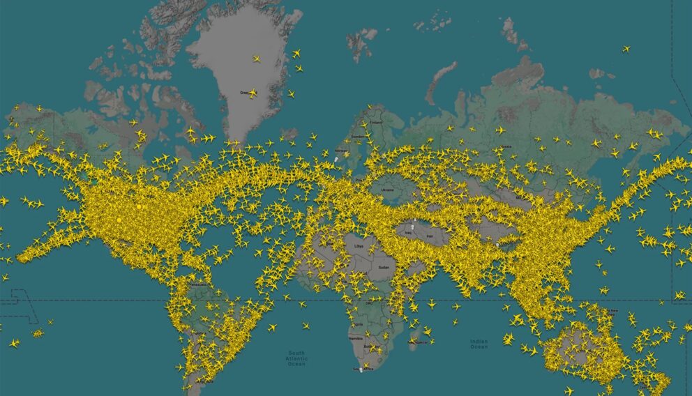world map with aircraft icons marking their positions, showing flight routes and no-fly zones