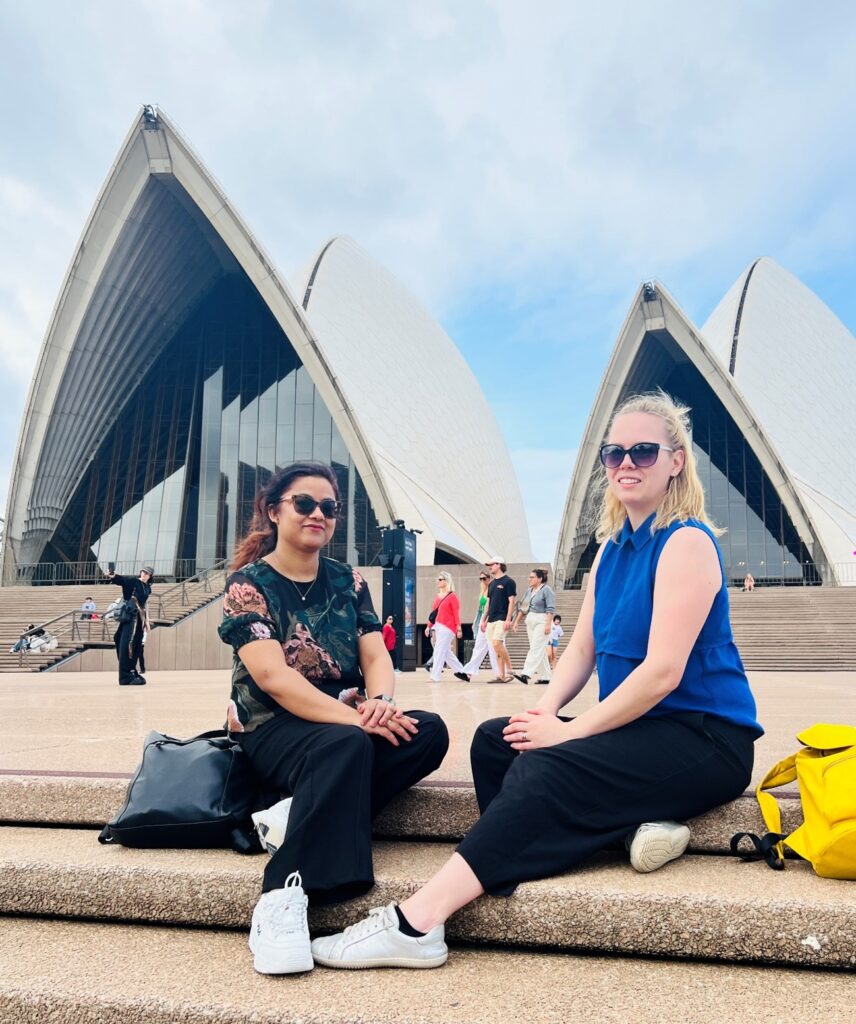 Sydney Opera House and  visiting researchers Postdoc Sanu Mahat and Doctoral Researcher Saija Koskiniemi