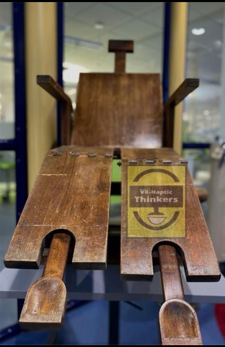 A wooden dental chair.
