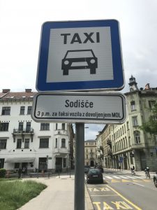 Taxi sign in front of the Main Courthouse.