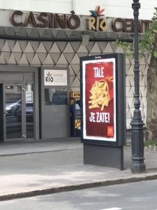 Street billboard for McDonalds, behind the façade of a casino.