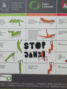 Board of the outdoor fitness with spraypainted stencil saying Stop Janši.