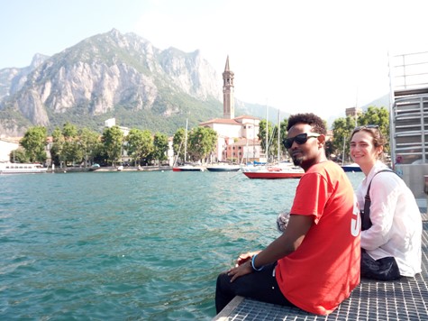 Two research participants are sitting by water.