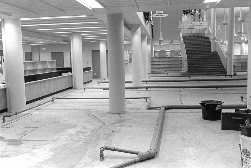 Opened floor with intersecting pipes